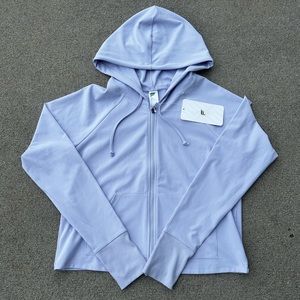 Women’s new with tags light purple Fabletics workout jacket